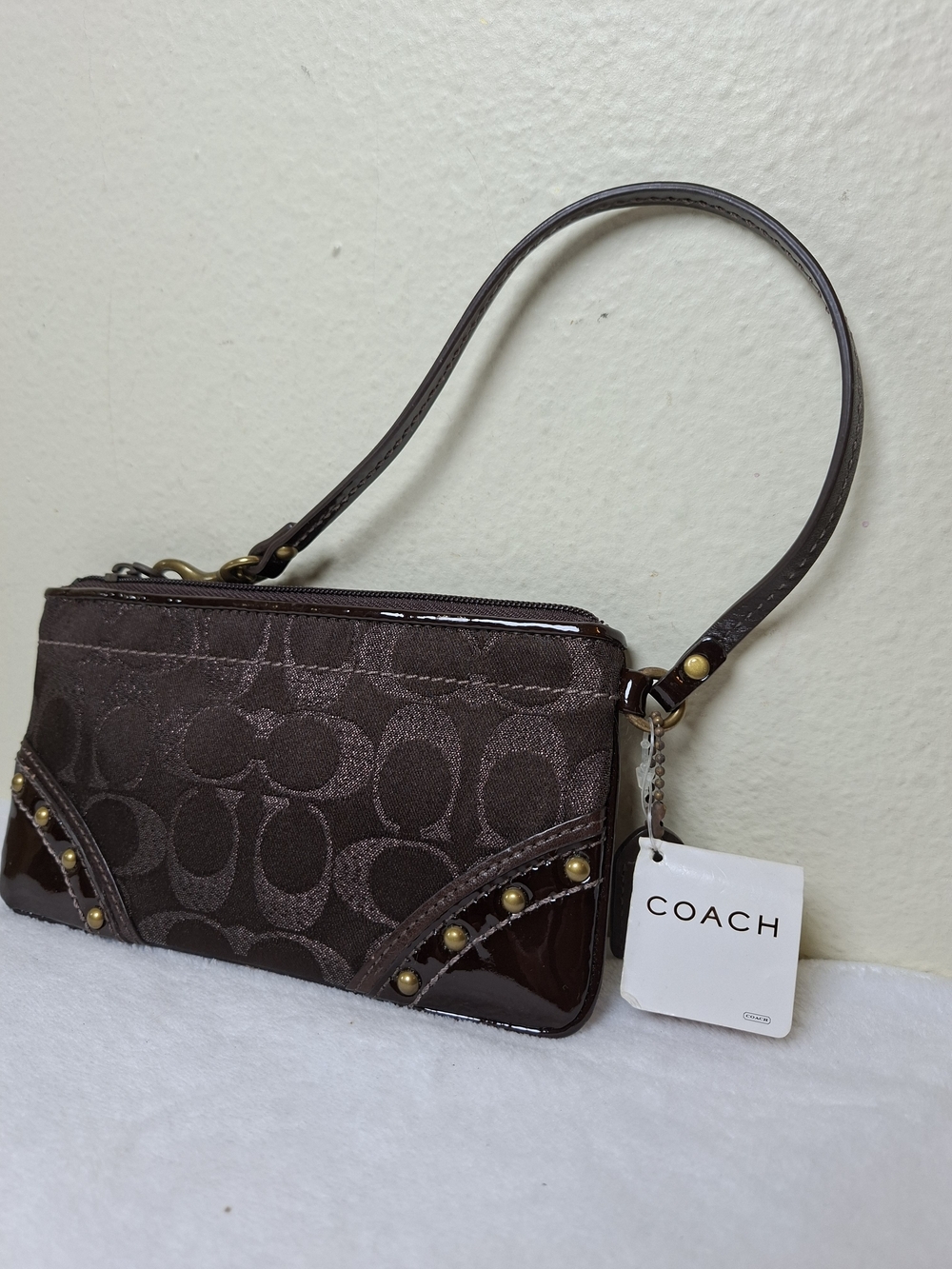 Coach Plaque Signature Jacquard Wristlet in Dark Brown